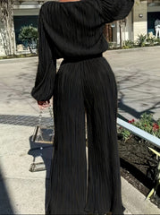 Élégance Noire – Plissee-Jumpsuit der Extraklasse“