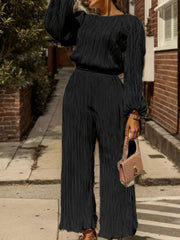 Élégance Noire – Plissee-Jumpsuit der Extraklasse“