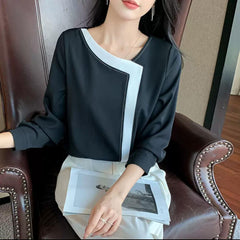 Moderne Eleganz – Zweifarbige Bluse „Lina“