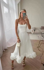 Blossom Elegance – Sommerkleid mit Blüten-Saum