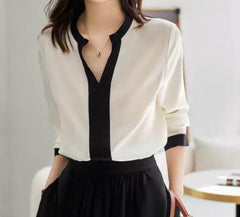 Noir Élégance – Zweifarbige Seidenbluse