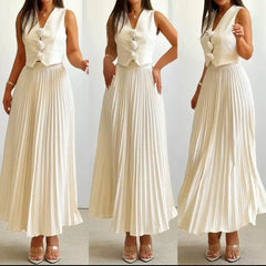Elena – Elegantes Faltenkleid mit Rosenakzenten