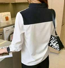 Noir Élégance – Zweifarbige Seidenbluse