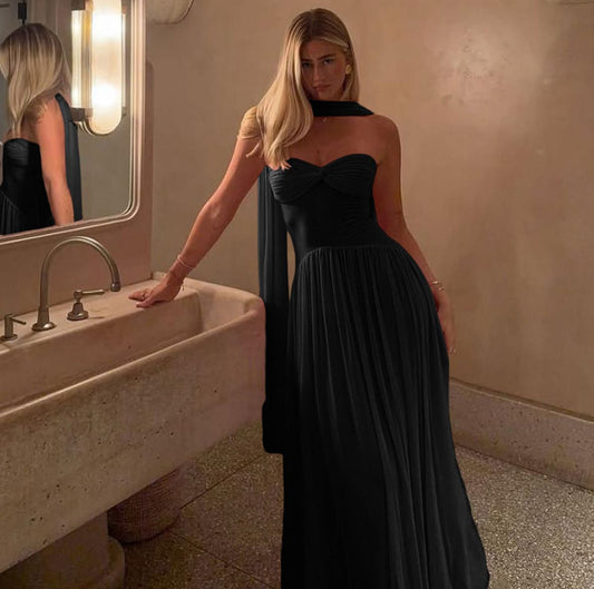 Elegant black evening dress with draping