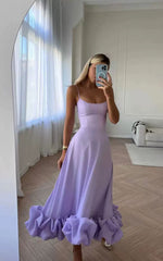 Blossom Elegance – Sommerkleid mit Blüten-Saum