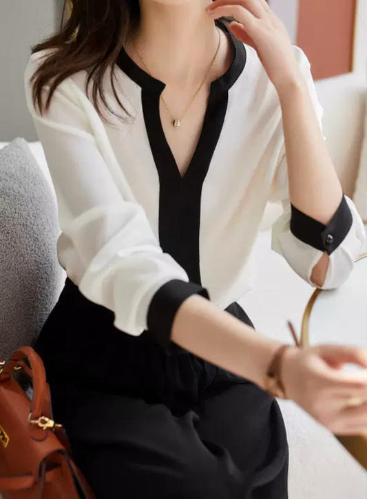 Noir Élégance – Zweifarbige Seidenbluse